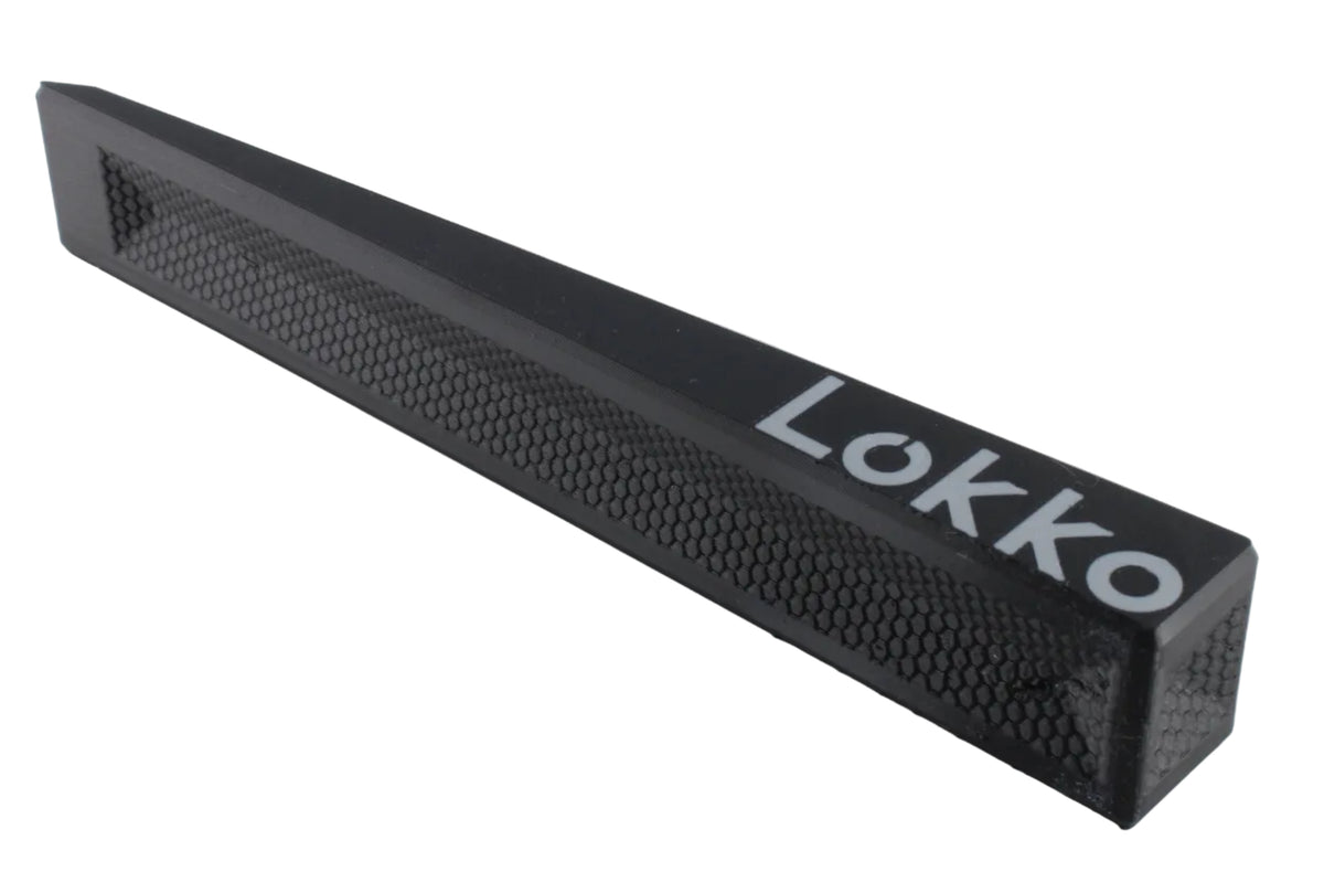 A black textured locksmith wedge with the brand name 'Lokko' printed in white on one end, shown on a clean white background.