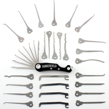Dangerfield Skeleton Multitool with 26 Piece Lock Pick Expansion Set laid out in an array, showcasing EDC tools and rakes.