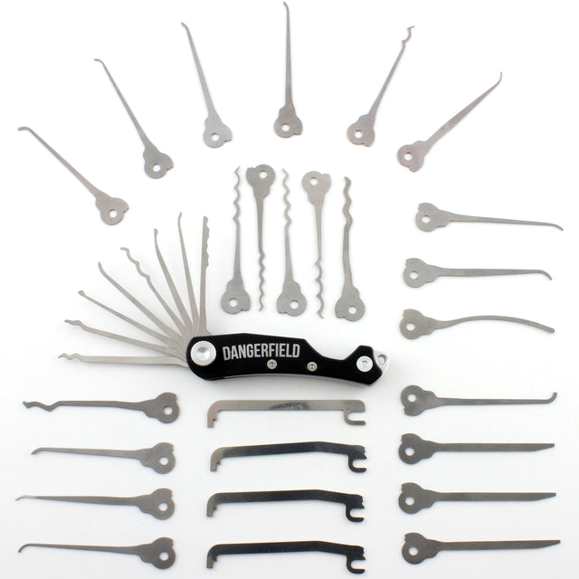 Dangerfield Skeleton Multitool with 26 Piece Lock Pick Expansion Set laid out in an array, showcasing EDC tools and rakes.