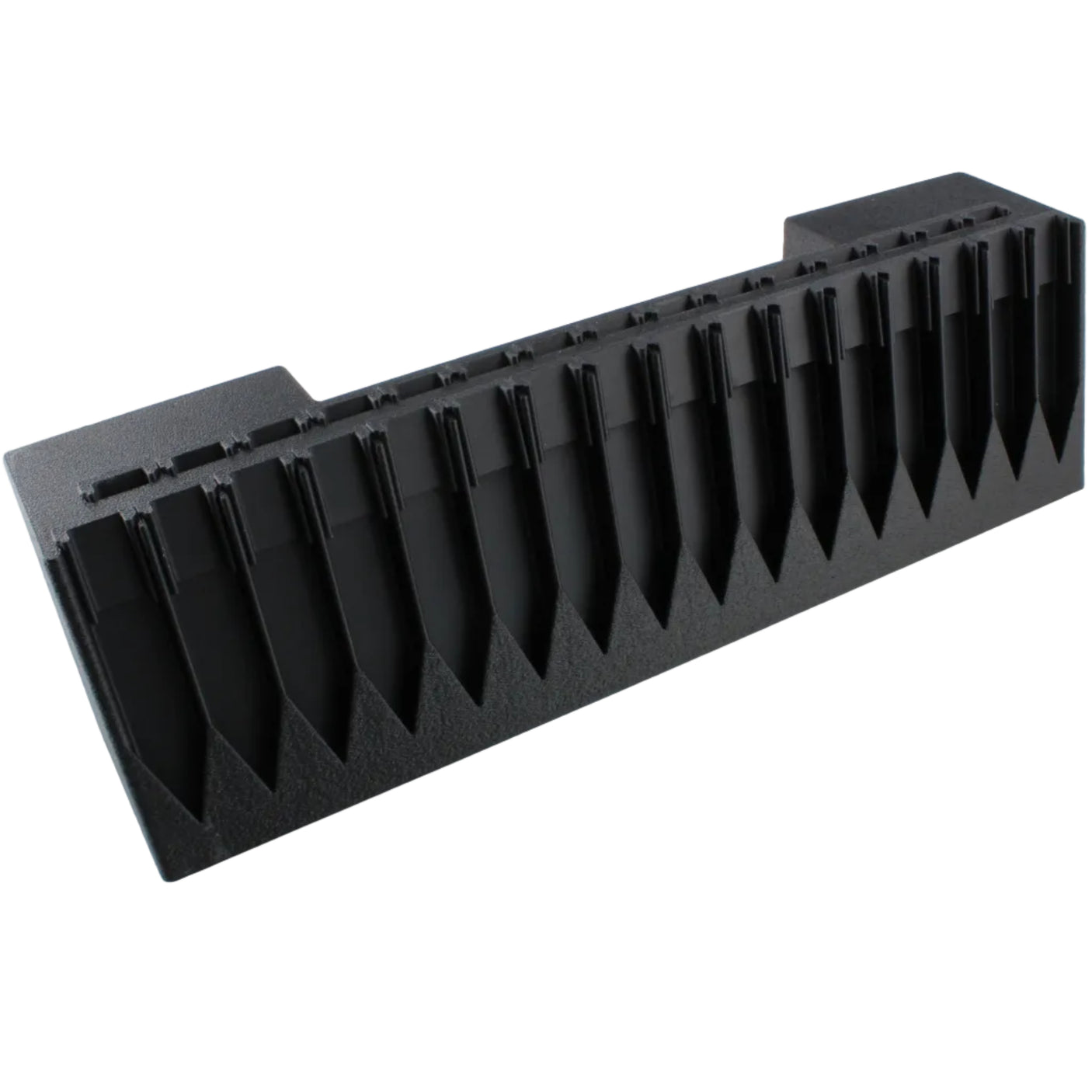Black plastic component on a white background