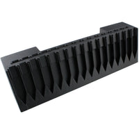 Black plastic component on a white background