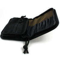 Dangerfield Jackal lock pick case opening, zipped inner pocket on one face and tan panel with individual tool pockets on the other