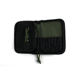 Dangerfield Viper lock pick case open at an angle, green paracord pull on the inner zipped pocket
