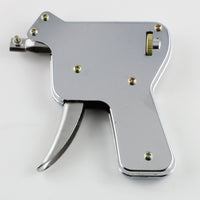 Lokko manual pick gun angled to show the needle holder ready to snap