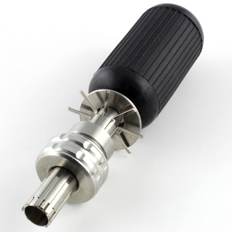 Front angle of the Lokko tubular pick showing seven stainless picking needles ringed around the central guide post