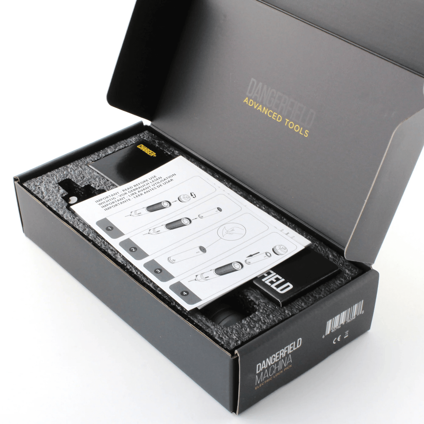 Open box containing a Machina EPG with a manual, on a white background