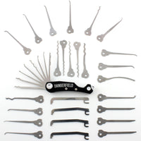 Dangerfield Skeleton Multitool with 26 Piece Lock Pick Expansion Set laid out in an array, showcasing EDC tools and rakes.